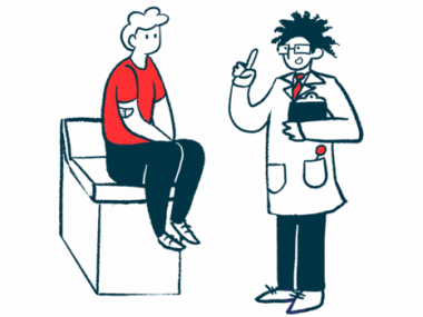 A doctor talks to a patient sitting on the edge of an examination table.