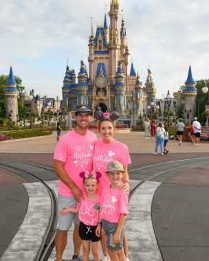 disease progression | Friedreich's Ataxia News | Kendall's family poses a third time in front of Disney World's Magic Kingdom. They're all wearing pink T-shirts.