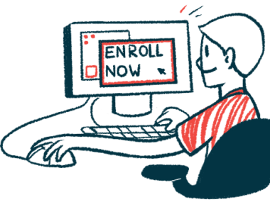 A young man sits at a computer to enroll in a clinical study.