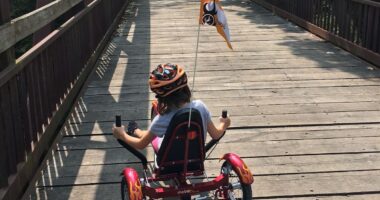 Elizabeth's daughter riding a bike