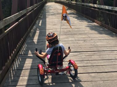 Elizabeth's daughter riding a bike