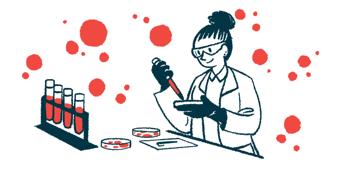 A scientist uses a pipette to fill a petri dish in a laboratory.