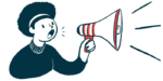 A person speaks using a megaphone.
