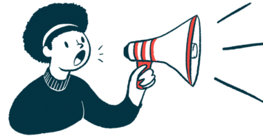 A person speaks using a megaphone.