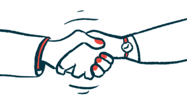 Hands come together in a handshake, illustrating an agreement.