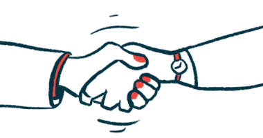 Hands come together in a handshake, illustrating an agreement.