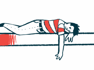 A person lays facing down on a bench, head resting on one arm with the other arm dangling down.
