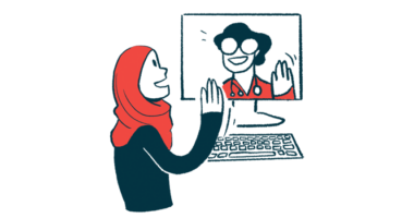 A patient and a doctor, shown on a computer screen, wave to each other during a virtual medical appointment.