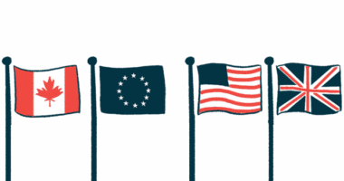 A row of flagpoles features the flags of Canada, the European Union, the U.S., and the U.K.