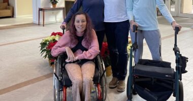 A photo shows the Maugee family.