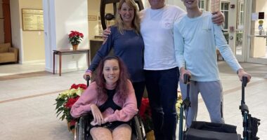 A photo shows the Maugee family.