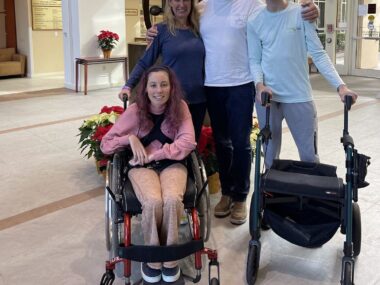 A photo shows the Maugee family.