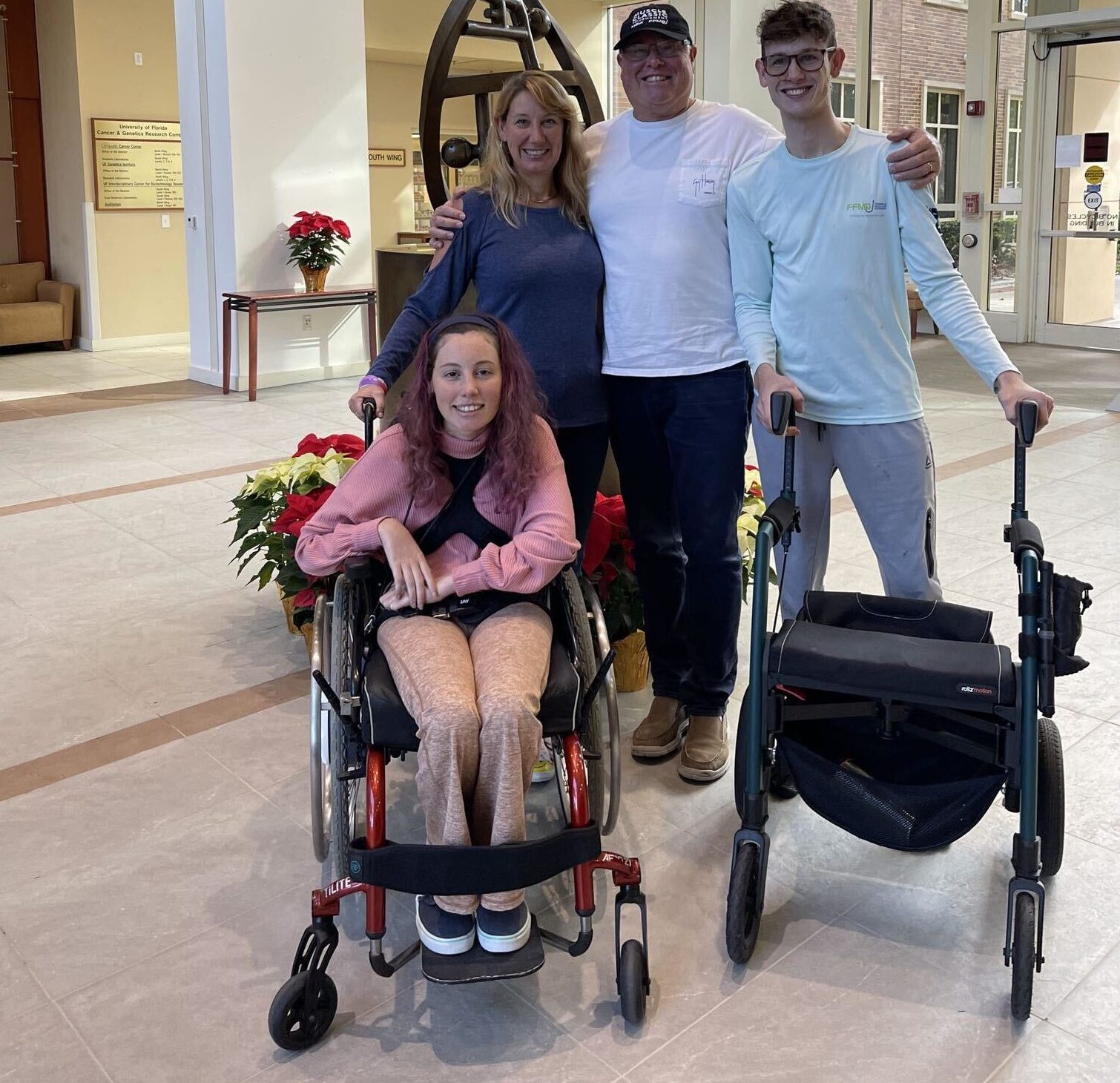 A photo shows the Maugee family.